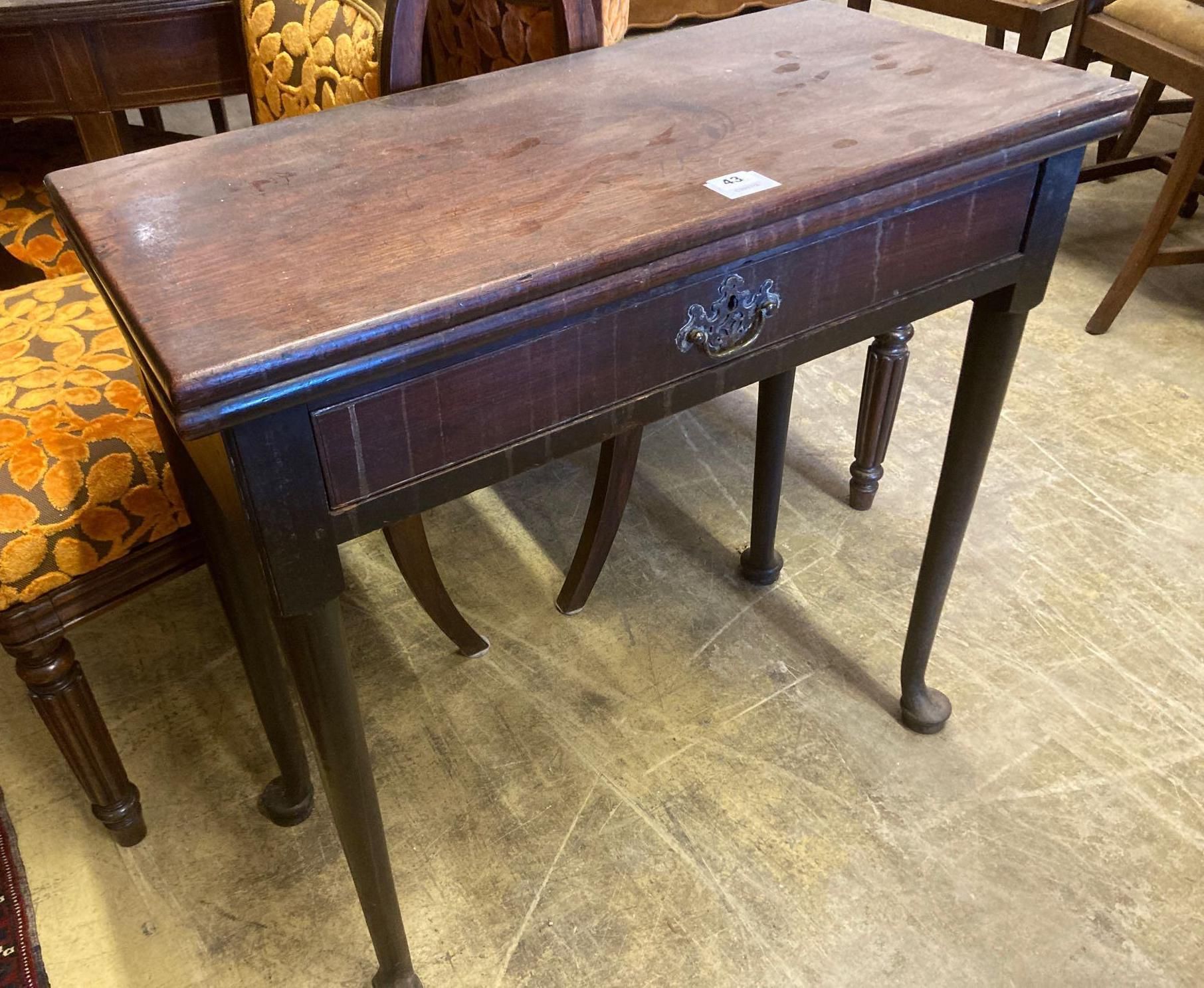 A mid 18th century mahogany folding top tea table, with frieze drawer, width 76cm